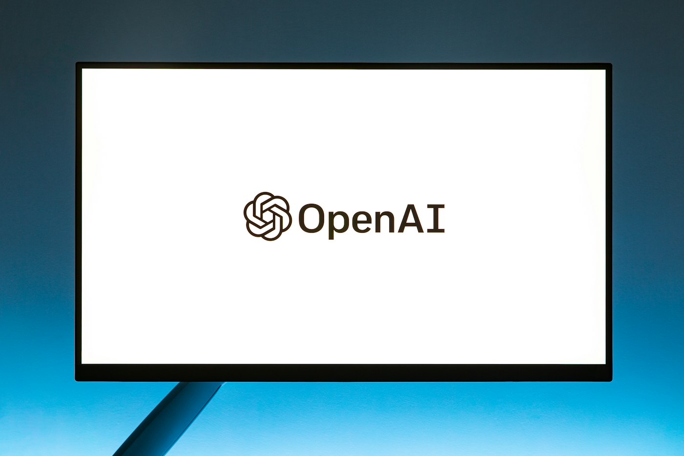 Le logo d’OpenAI affiché sur un écran d’ordinateur